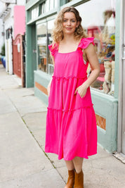 Lots To Love Fuchsia Smocked Flutter Sleeve Tiered Midi Dress | Daverri Fashions