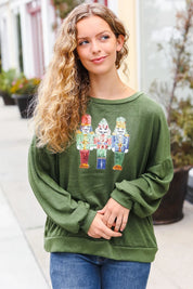 Be Merry Forest Green Nutcracker Sequin Hacci Top | Daverri Fashions