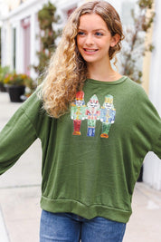 Be Merry Forest Green Nutcracker Sequin Hacci Top | Daverri Fashions