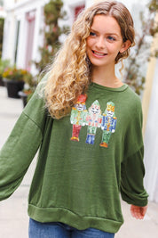Be Merry Forest Green Nutcracker Sequin Hacci Top | Daverri Fashions