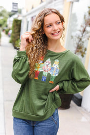 Be Merry Forest Green Nutcracker Sequin Hacci Top | Daverri Fashions