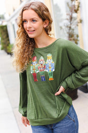 Be Merry Forest Green Nutcracker Sequin Hacci Top | Daverri Fashions