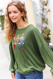 Be Merry Forest Green Nutcracker Sequin Hacci Top | Daverri Fashions
