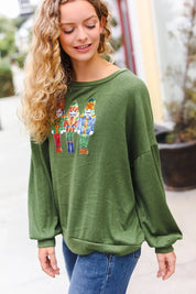 Be Merry Forest Green Nutcracker Sequin Hacci Top | Daverri Fashions