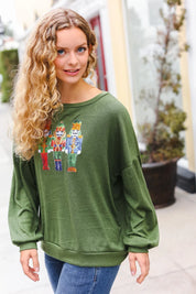 Be Merry Forest Green Nutcracker Sequin Hacci Top | Daverri Fashions