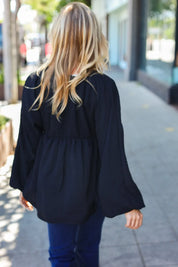 Simple Elegance Black V Neck Babydoll Woven Top | Daverri Fashions