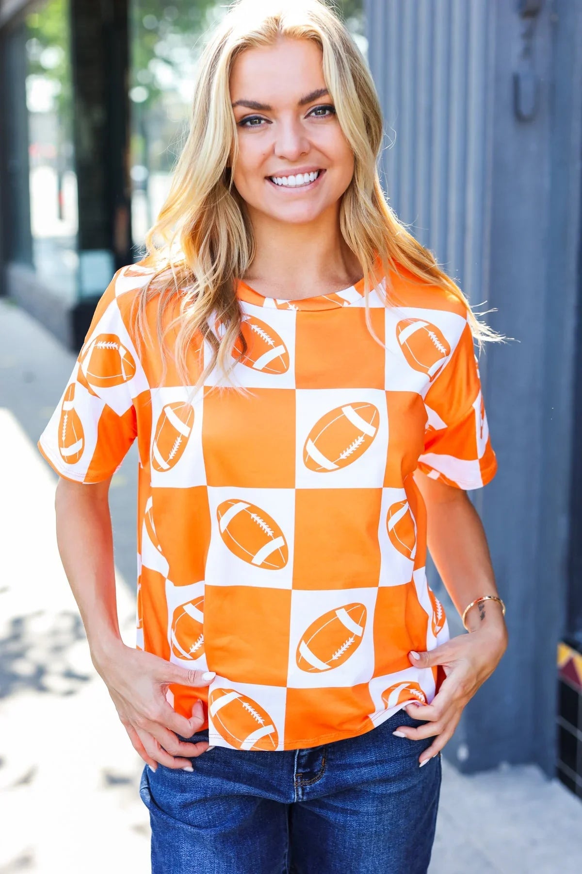 Turn Up The Volume Orange Football Checker Top | Daverri Fashions