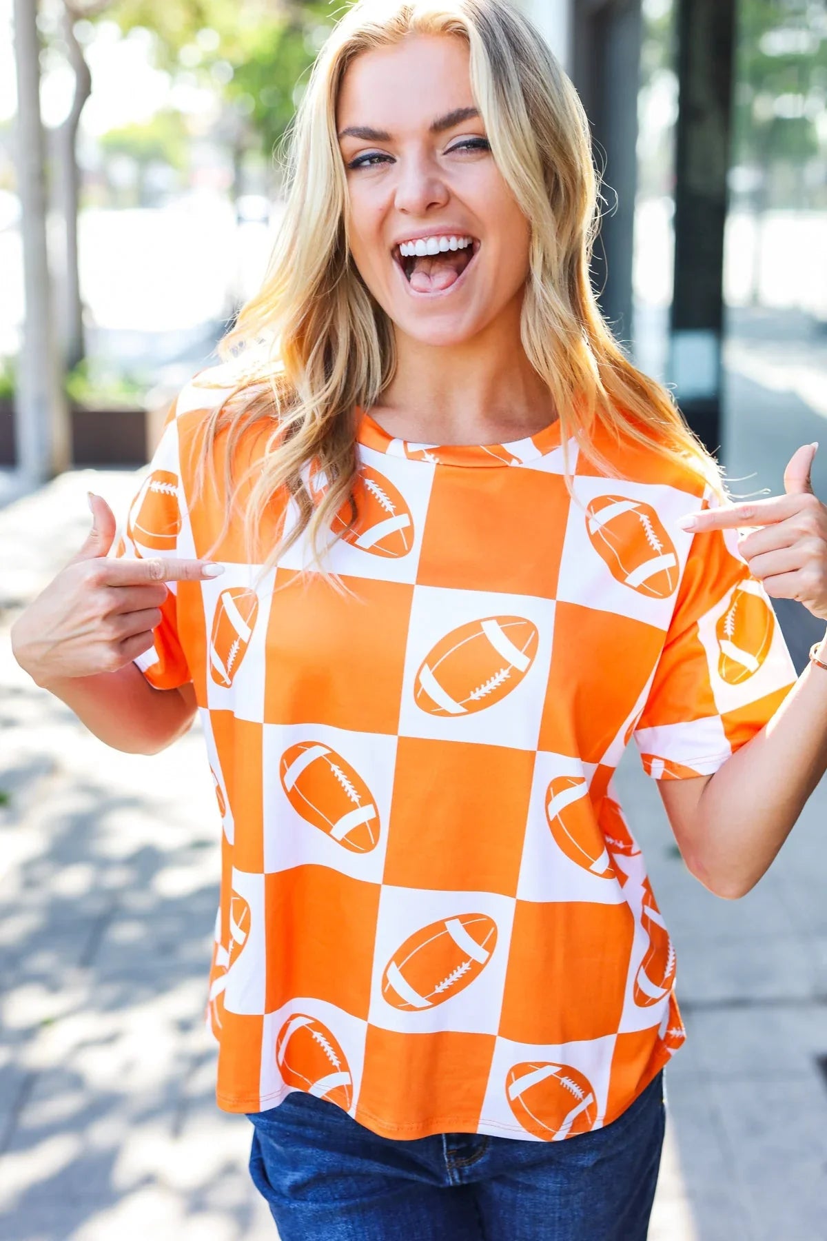 Turn Up The Volume Orange Football Checker Top | Daverri Fashions