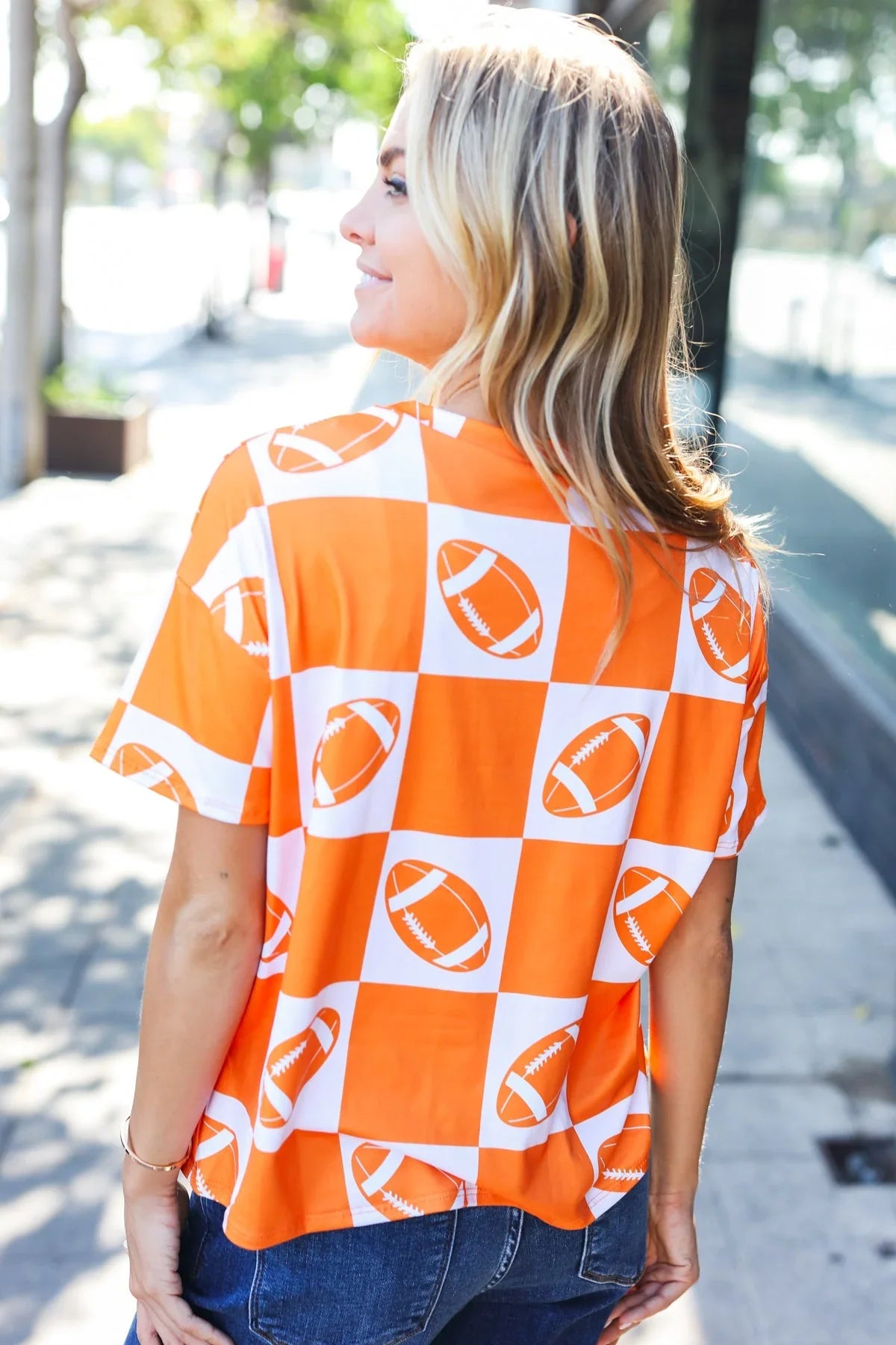 Turn Up The Volume Orange Football Checker Top | Daverri Fashions