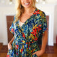 Navy Tropical Floral Surplice Romper - DAVERRI FASHIONS