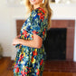 Navy Tropical Floral Surplice Romper - DAVERRI FASHIONS