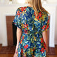 Navy Tropical Floral Surplice Romper - DAVERRI FASHIONS