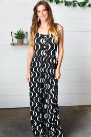 Black Abstract Wave Button Jumpsuit | Daverri Fashions