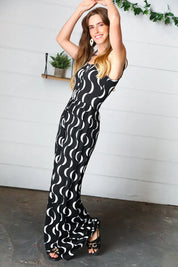 Black Abstract Wave Button Jumpsuit | Daverri Fashions