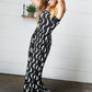 Black Abstract Wave Button Jumpsuit - DAVERRI FASHIONS
