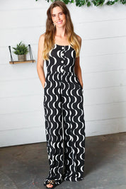 Black Abstract Wave Button Jumpsuit | Daverri Fashions