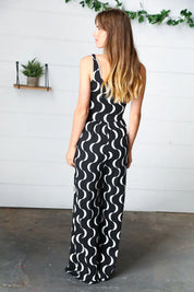 Black Abstract Wave Button Jumpsuit | Daverri Fashions