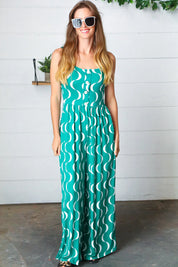 Kelly Green Abstract Wave Button Jumpsuit | Daverri Fashions