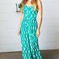 Kelly Green Abstract Wave Button Jumpsuit - DAVERRI FASHIONS