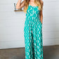 Kelly Green Abstract Wave Button Jumpsuit - DAVERRI FASHIONS