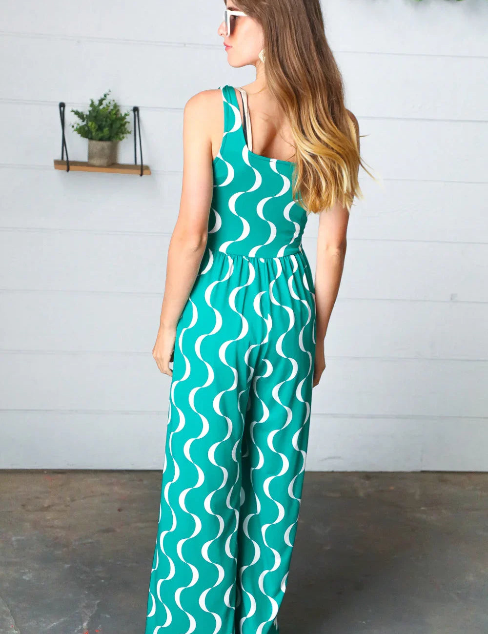 Kelly Green Abstract Wave Button Jumpsuit | Daverri Fashions
