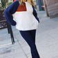 Navy blue and cream color block sherpa pullover with brown accent panel