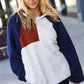 Cozy navy and taupe quarter zip sherpa pullover with rust chest panel