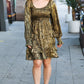 Gold metallic ruffled long-sleeve fit and flare dress with ankle boots