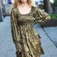 Gold sequined mini dress with ruffled hem and long sleeves
