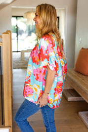 Weekend Ready Aqua & Coral Floral V Neck Woven Top | Daverri Fashions
