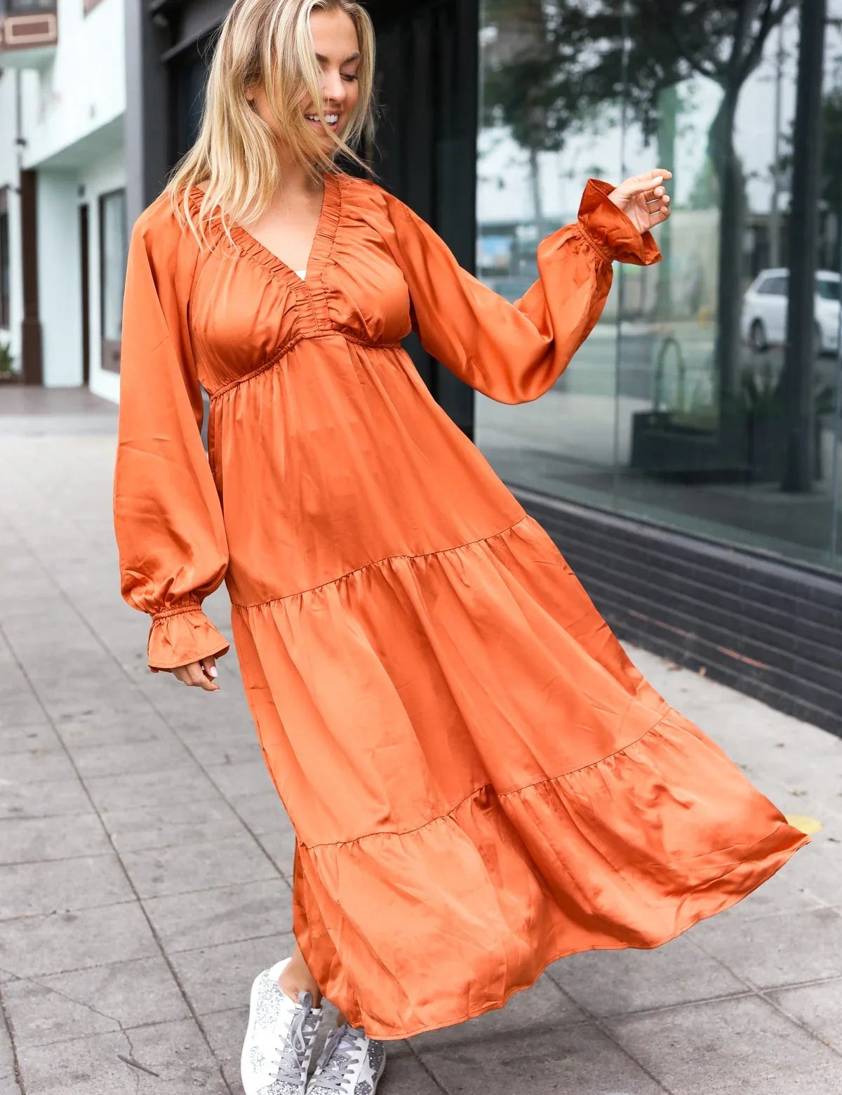 Elegant Rust Elastic V Neck Tiered Satin Maxi Dress | Daverri Fashions