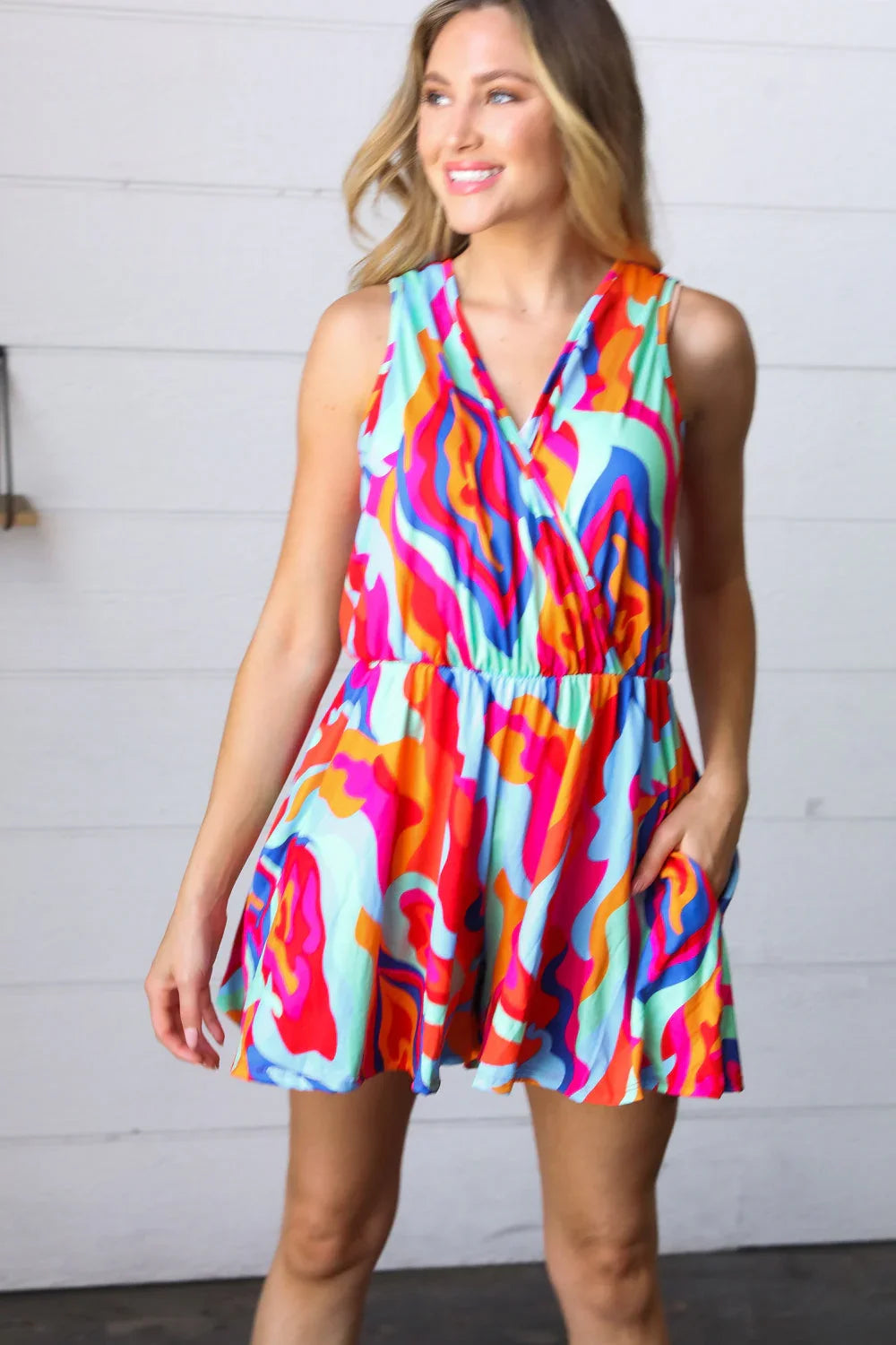 Vibrant Multicolor Abstract Sleeveless Surplice Romper | Daverri Fashions
