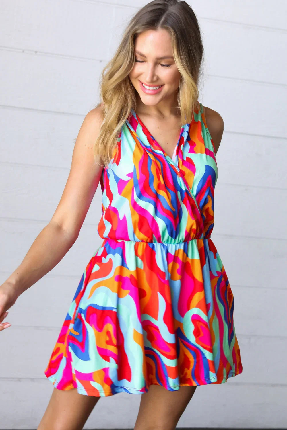 Vibrant Multicolor Abstract Sleeveless Surplice Romper | Daverri Fashions