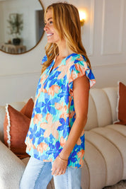 Tropical Breeze Turquoise Floral Banded V Neck Flutter Sleeve Top | Daverri Fashions