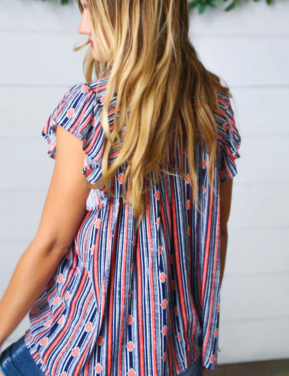 Navy & Orange Boho Stripe Flutter Sleeve Top | Daverri Fashions