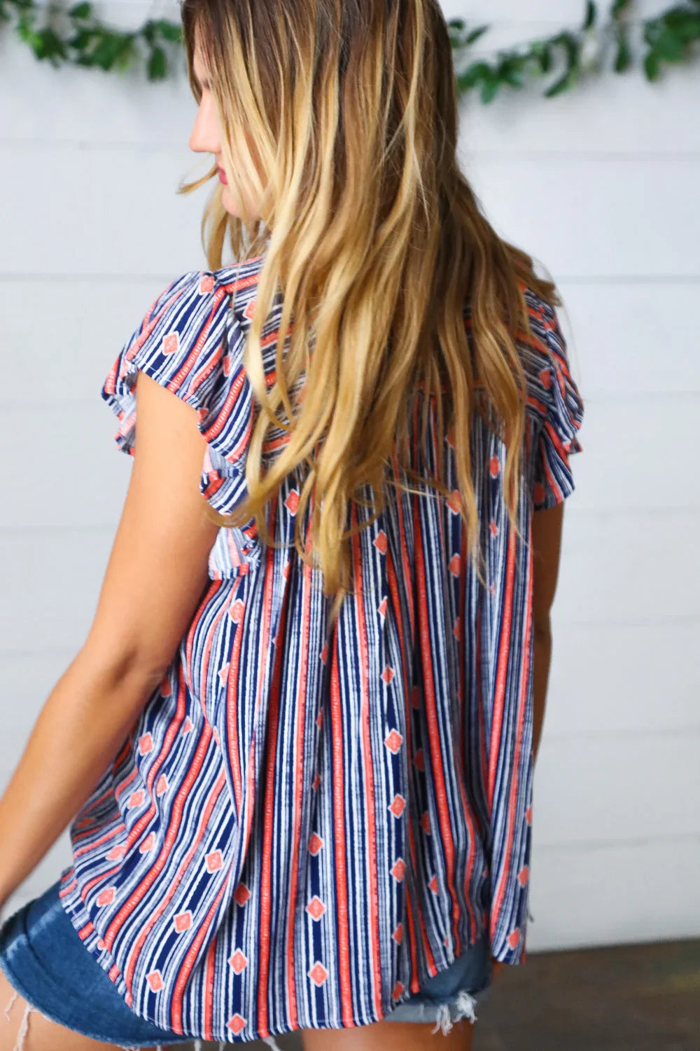 Navy & Orange Boho Stripe Flutter Sleeve Top | Daverri Fashions