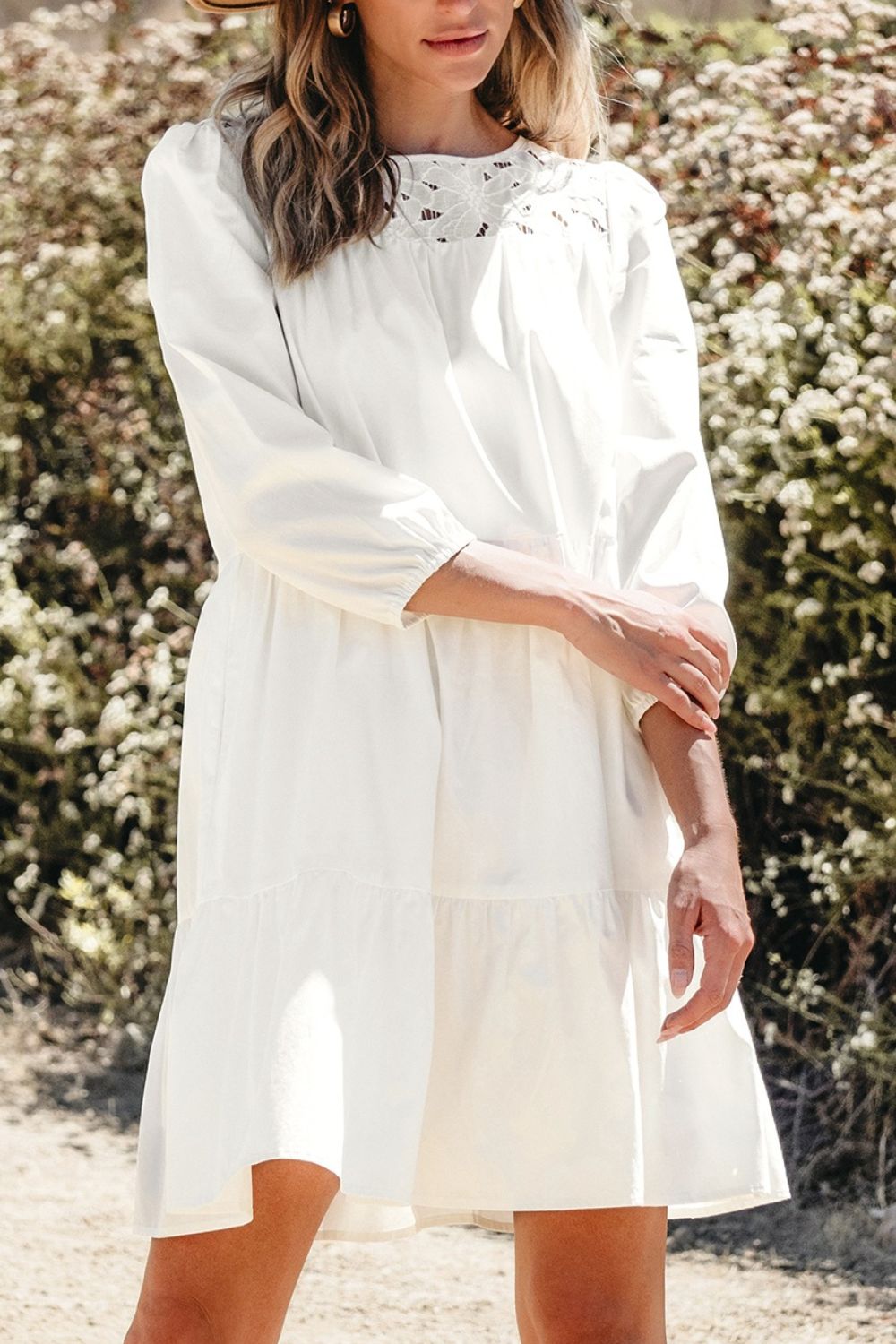 White 3/4 sleeve tiered mini dress with lace neckline and cotton fabric