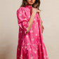 Vibrant pink BiBi ribbon pattern scallop edge short sleeve tiered dress