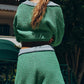 Green knitted cropped sweater with gray contrast collar and hem