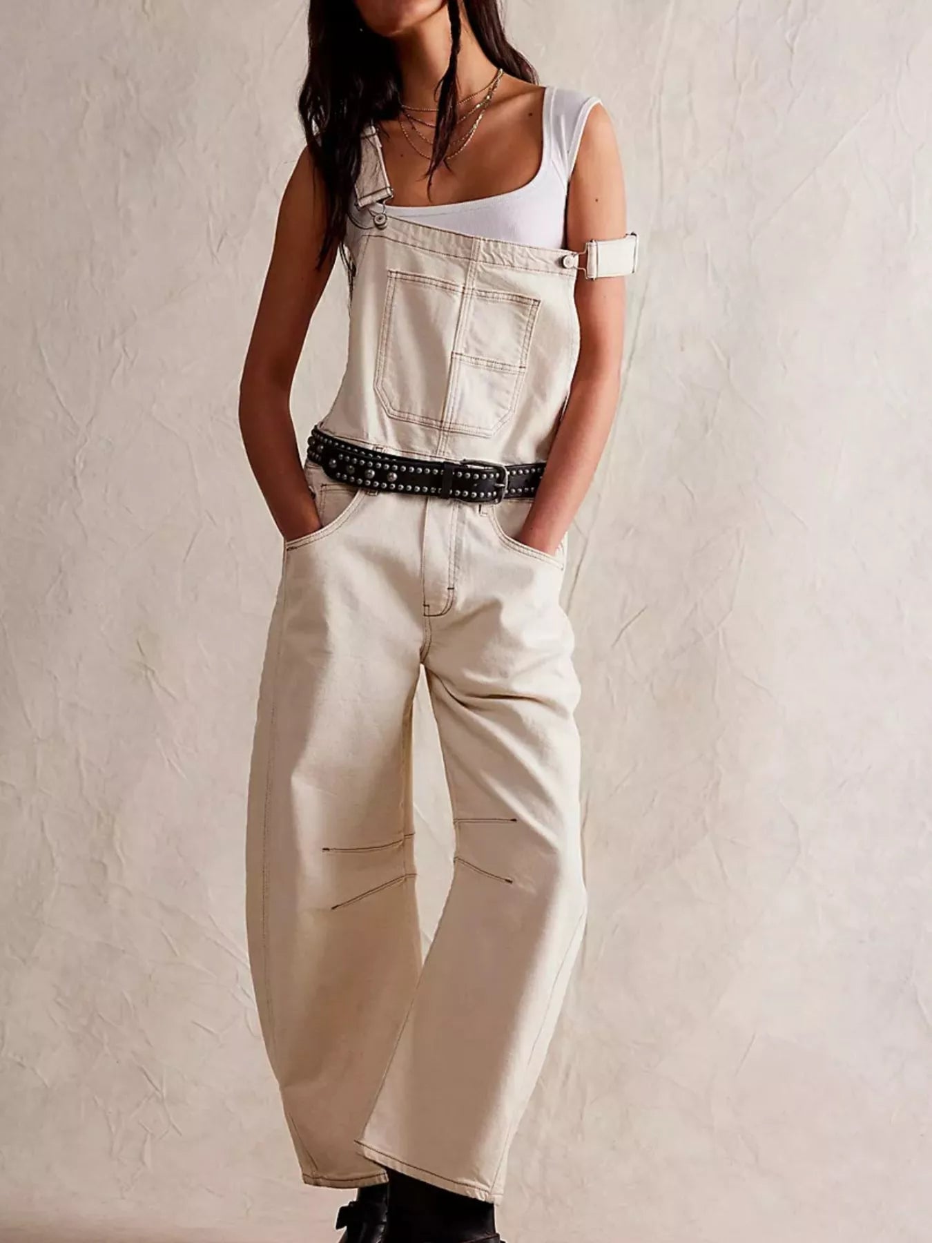 Wide strap wide leg denim overalls in cream with white strap detail and black studded belt