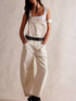 Wide strap wide leg denim overalls in cream with white strap detail and black studded belt