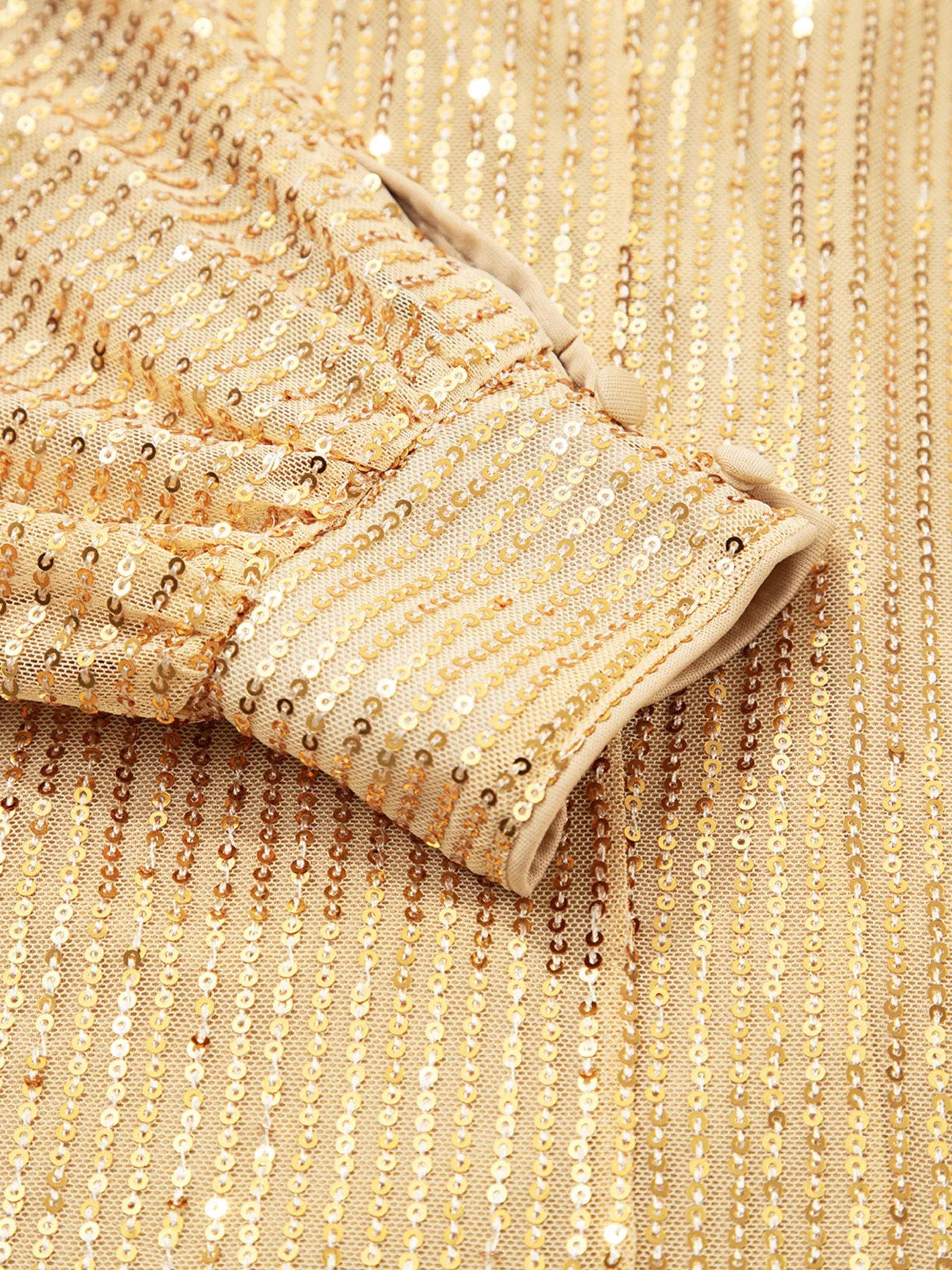 Gold sequined sweater with balloon sleeves and high neck