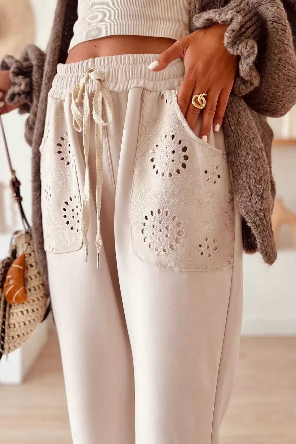 Cream-colored embroidered Drawstring Loose Fit Pants with pocket cutouts