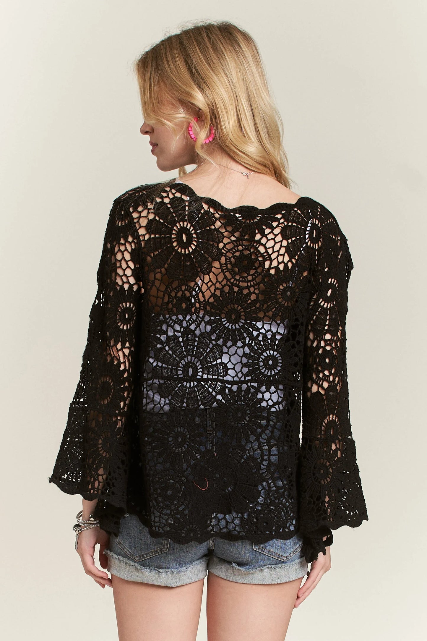 Adora Bell Sleeve Crochet Top in black lace with floral patterns
