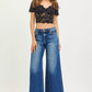 RISEN high-rise wide-leg blue denim jeans with frayed hems