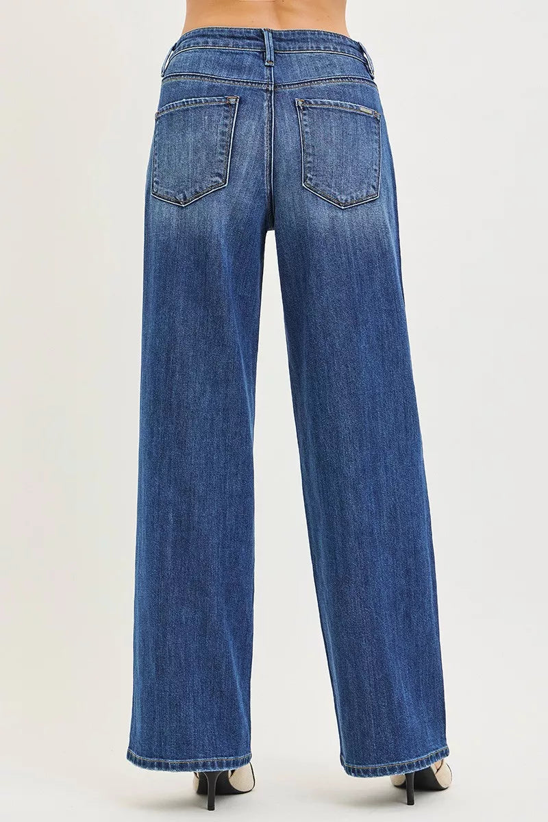 RISEN slouchy baggy blue denim jeans with five-pocket design and frayed hems