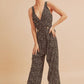 Aemi + Co Ditsy Floral Surplice Sleeveless Wide Leg Jumpsuit Jumpsuits