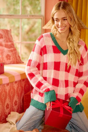 Red and white plaid BiBi Christmas sweater with green accents