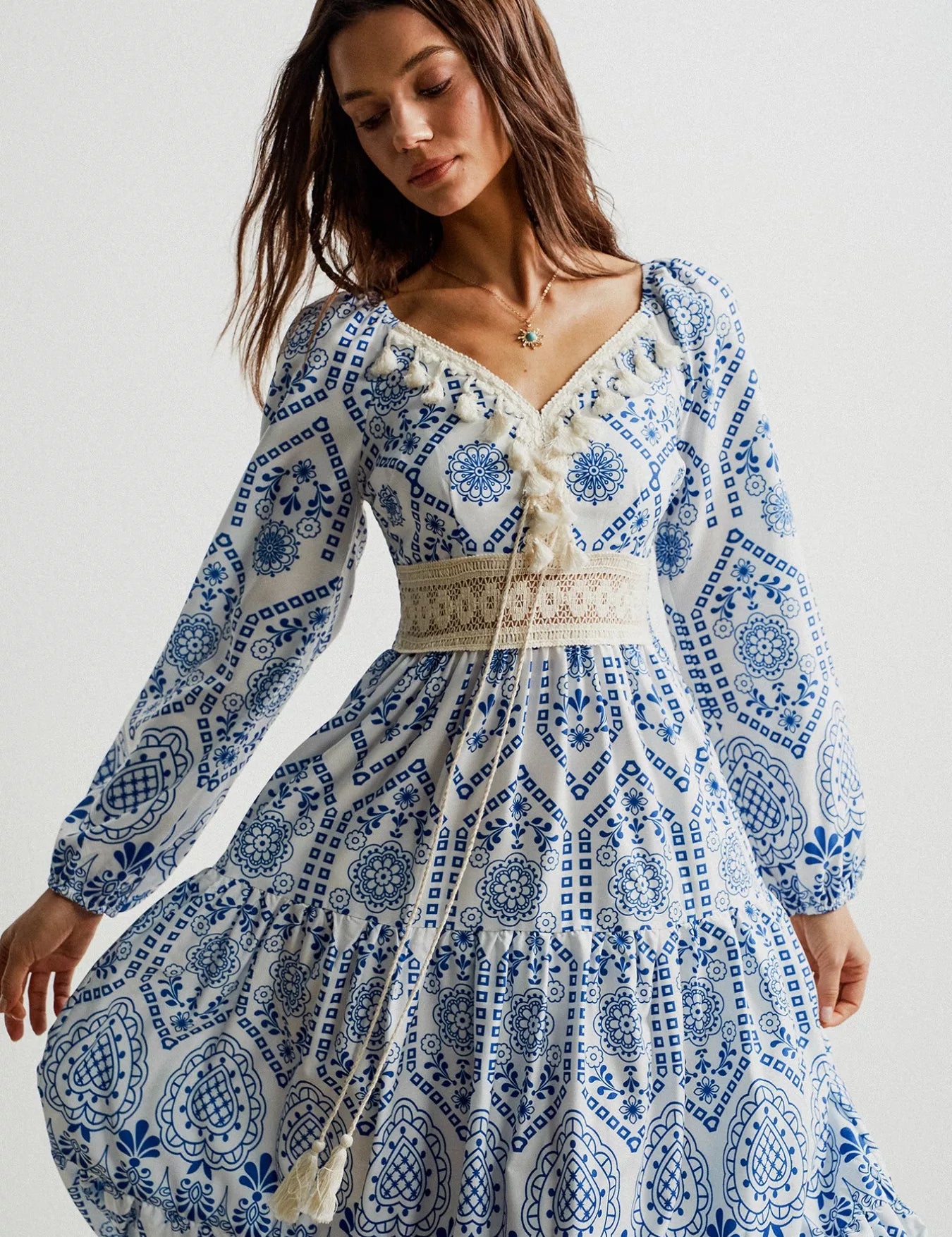 Bohemian blue and white print midi dress with lace trim and tassels