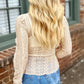 Beige lace long-sleeve blouse with ruffled cuffs and smocked waistband